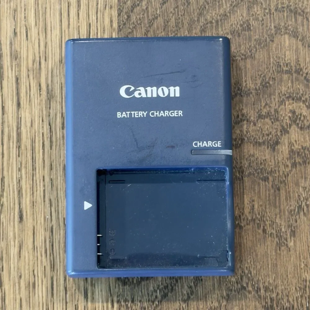 Canon PowerShot Digital ELPH SD890 IS 10MP Camera Manual Charger Open Box Tested